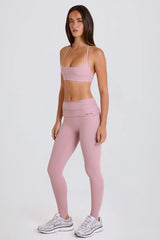 Four-Way Stretch Foldover Mid-Rise Stirrup Leggings in Mauve
