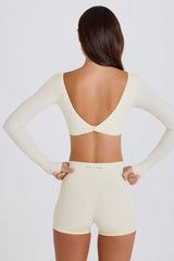 Four-Way Stretch Multiway Long-Sleeve Crop Top in Cream