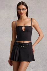 Belted Low-Rise Pleated Mini Skirt in Black
