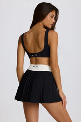 Soft Active Crossover Pleated Mini Skort in Black