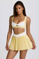 Soft Active Crossover Pleated Mini Skort in Lemon