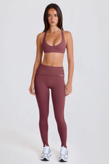 Four-Way Stretch Foldover Mid-Rise Stirrup Leggings in Acai