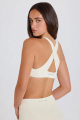 Four-Way Stretch Crossback V-Neck Sports Bra in Cream