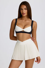 Soft Active Crossover Pleated Mini Skort in Ivory